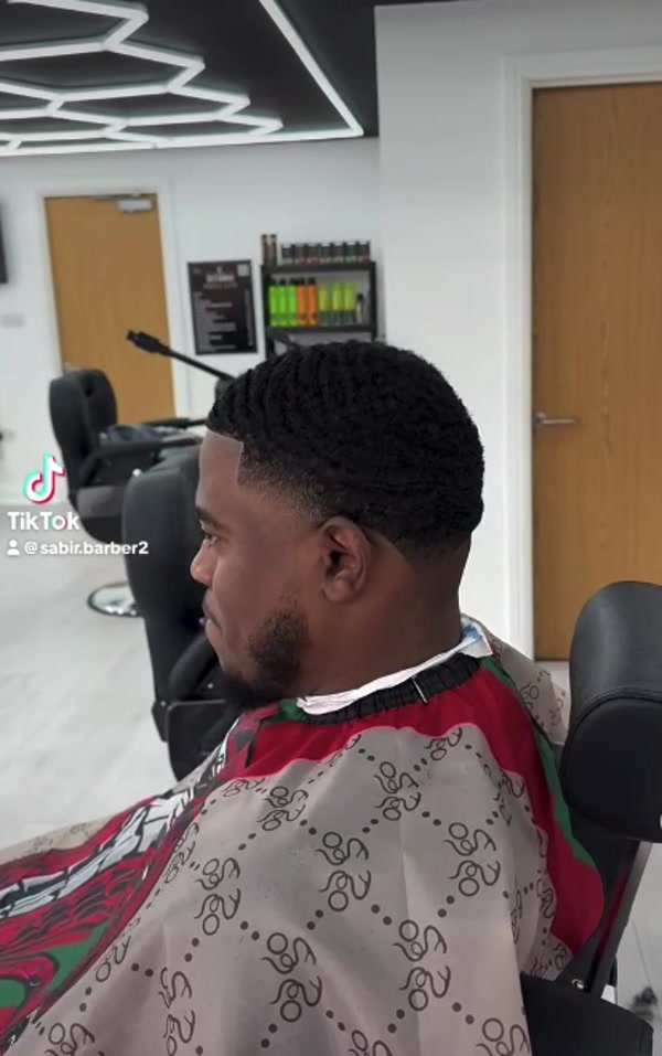 Side view of a fresh tapered haircut